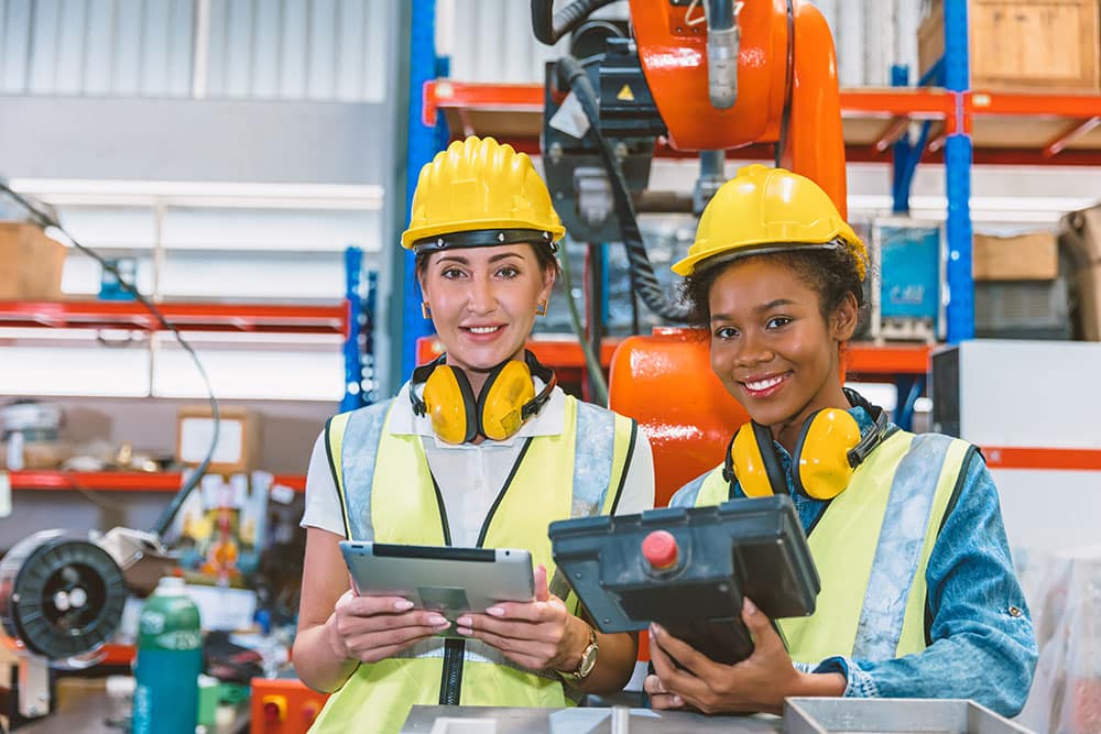 Women engineer training together at work